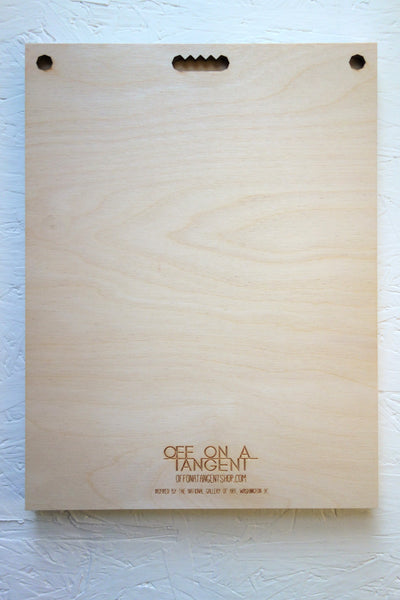 back view of artwork with mounting holes and artwork signature