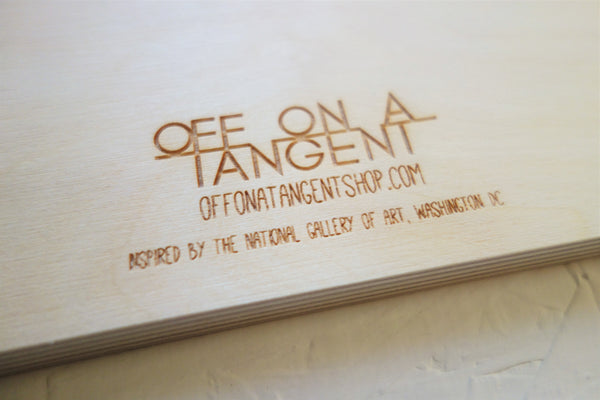 Artwork signature lasercut into back